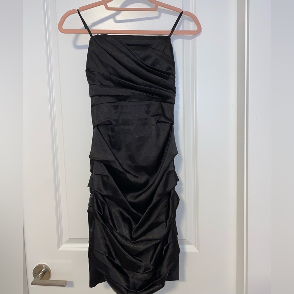 Le chateau ruffled little black cocktail dress